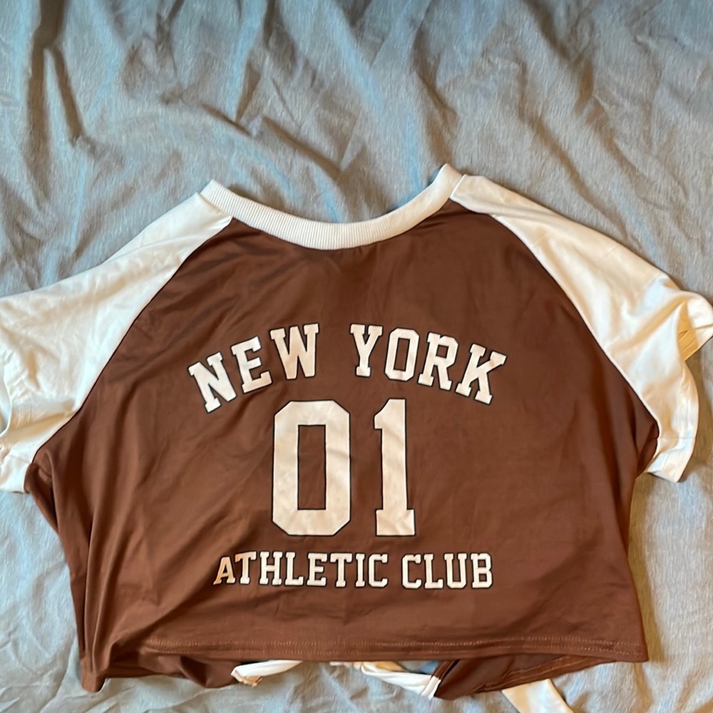 this is a Brown and White shirt, Size XL in Women